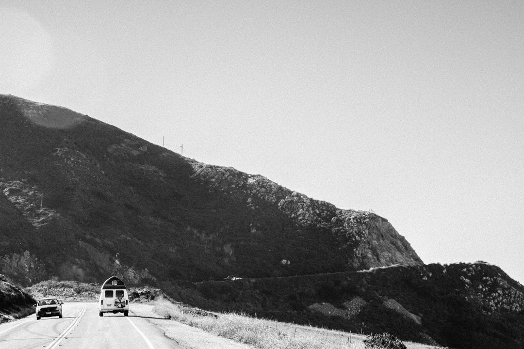 Picture of van on highway with hill in front