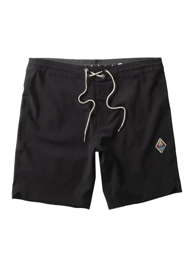 Vissla Men's all black Solid Sets 18.5" Boardshort witha retro diamond patch on the wearer's left leg