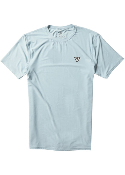 Vissla Men's cool blue heather twisted eco short sleeve with a black and white Vissla logo on the wearer's upper left chest